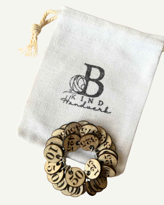 Framvindu-og leiðbeiningar prjónamerki